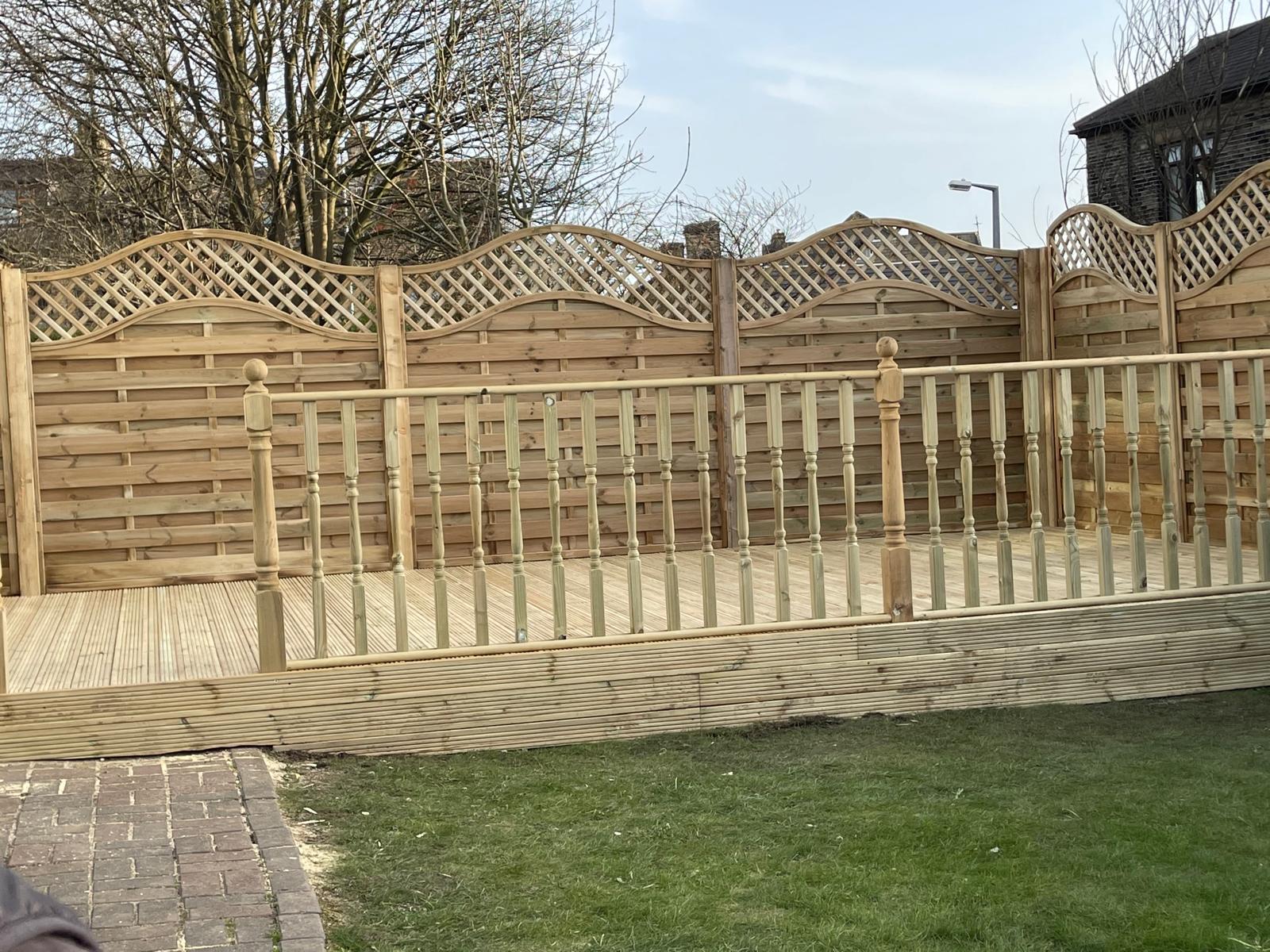 New timber decking with turned balustrade and decorative fencing